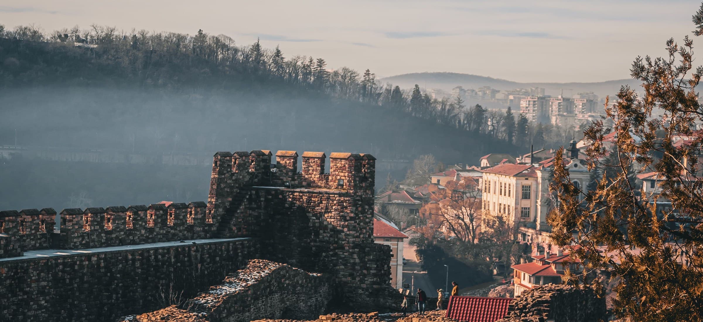Tsarevets Fortress and Veliko Tarnovo in morning mist, Bulgaria